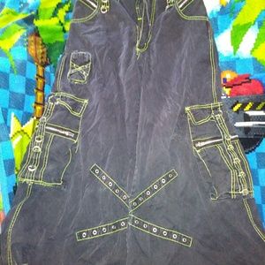 Tripp pants with green stitching